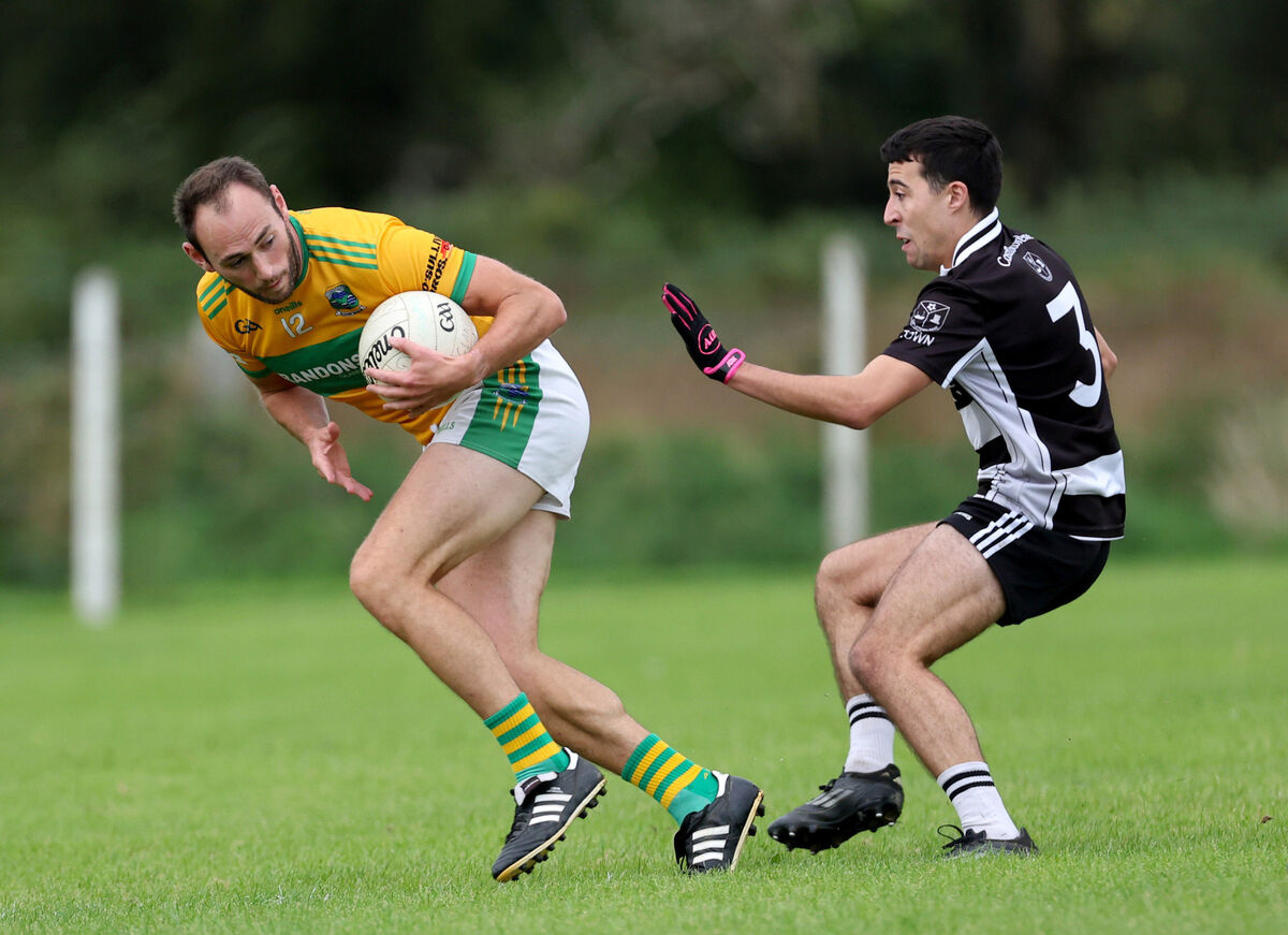  Tiernan Hourihan, Glanmire, gets away from Jonathan Rosales Harrington, Castletownbere. Picture: Jim Coughlan.