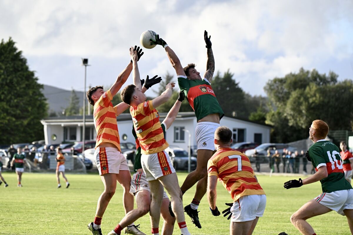 Thomas Clancy of Clonakilty gets a hand to the ball in the air against Newcestown. Picture: Larry Cummins Thomas Clancy of Clonakilty gets a hand to the ball in the air against Newcestown. Picture: Larry Cummins