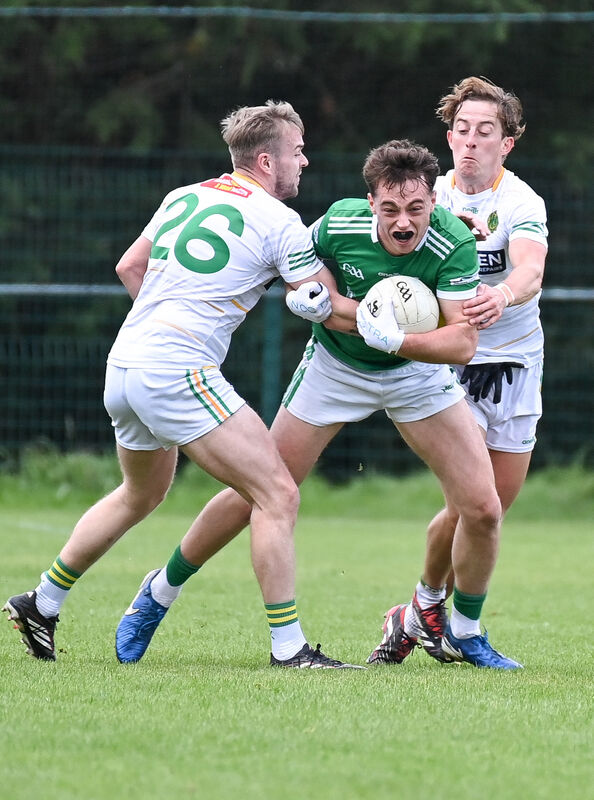 Ballincollig's Donncha Desmond is tackled by St Michael's Daniel Meaney and Robbie Cotter. Picture: David Keane. Ballincollig's Donncha Desmond is tackled by St Michael's Daniel Meaney and Robbie Cotter. Picture: David Keane.
