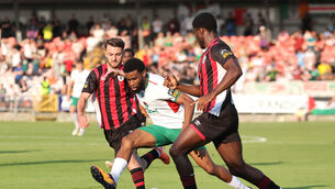 <p> Hans Mpongo, Cork City, breaks from Daniel McKenna and Osaze Irhue, Longford Town. Picture: Jim Coughlan.</p> <p> Hans Mpongo, Cork City, breaks from Daniel McKenna and Osaze Irhue, Longford Town. Picture: Jim Coughlan.</p>