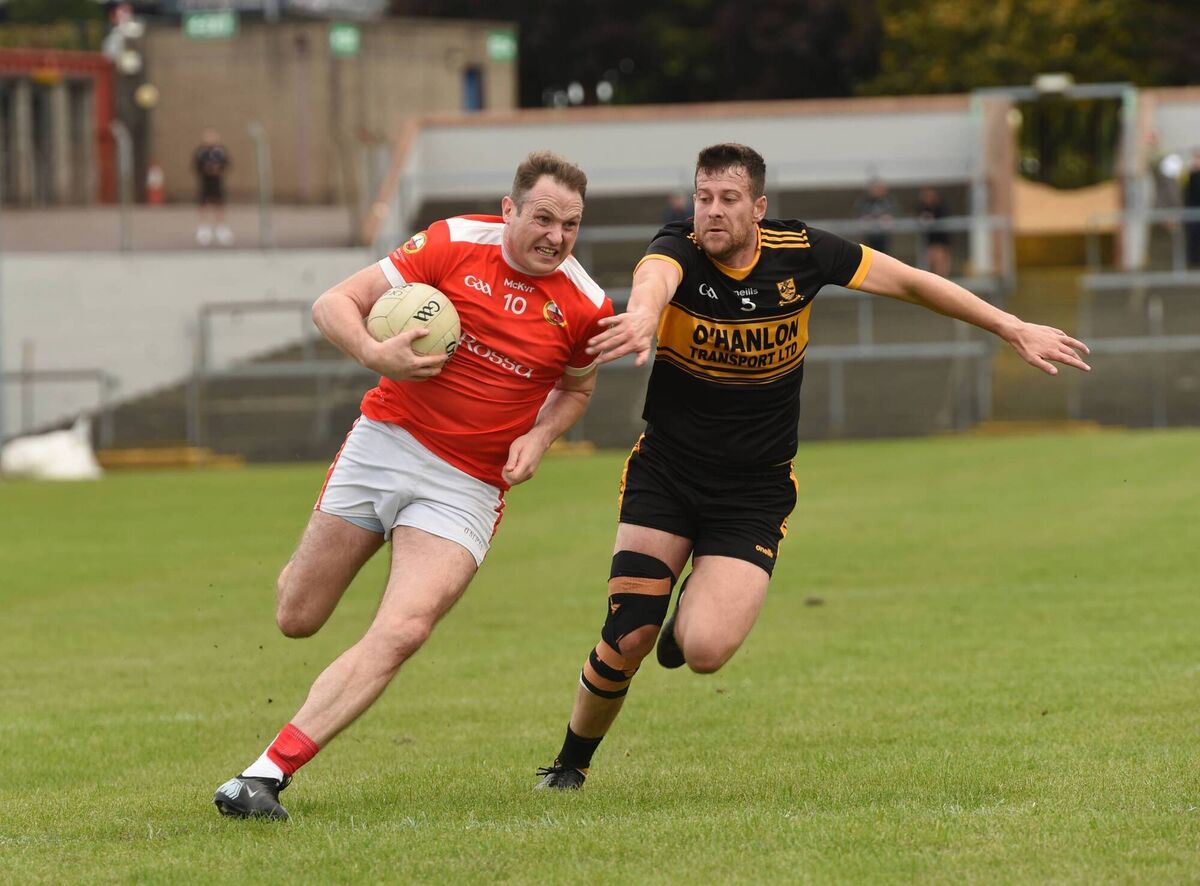 David Shannon of O'Donovan Rossa looks to breaks free from the challenge of Clyda Rovers' Colin Kelly. Picture: George Hatchell David Shannon of O'Donovan Rossa looks to breaks free from the challenge of Clyda Rovers' Colin Kelly. Picture: George Hatchell