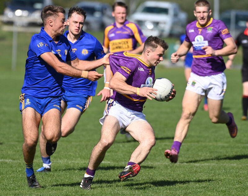 Carbery's Seán Daly is held by St Finbarr's William Buckley. Picture: Eddie O'Hare Carbery's Seán Daly is held by St Finbarr's William Buckley. Picture: Eddie O'Hare