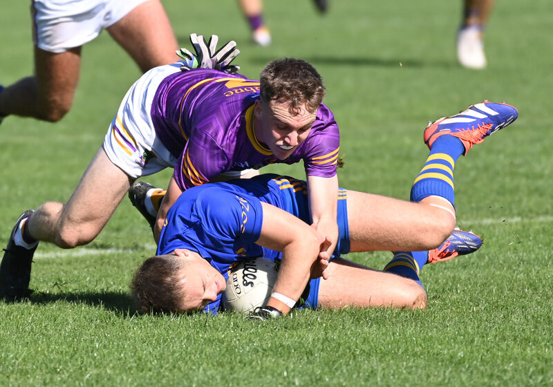 St Finbarr's Steven Sherlock is tackled by Carbery's Peter Collins. Picture: Eddie O'Hare St Finbarr's Steven Sherlock is tackled by Carbery's Peter Collins. Picture: Eddie O'Hare