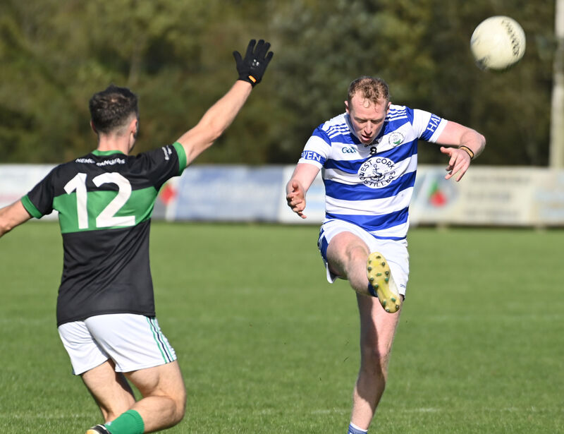 Castlehaven's Conor Cahalane shoots from Nemo Rangers' Conor Shalloe. Picture: Eddie O'Hare Castlehaven's Conor Cahalane shoots from Nemo Rangers' Conor Shalloe. Picture: Eddie O'Hare