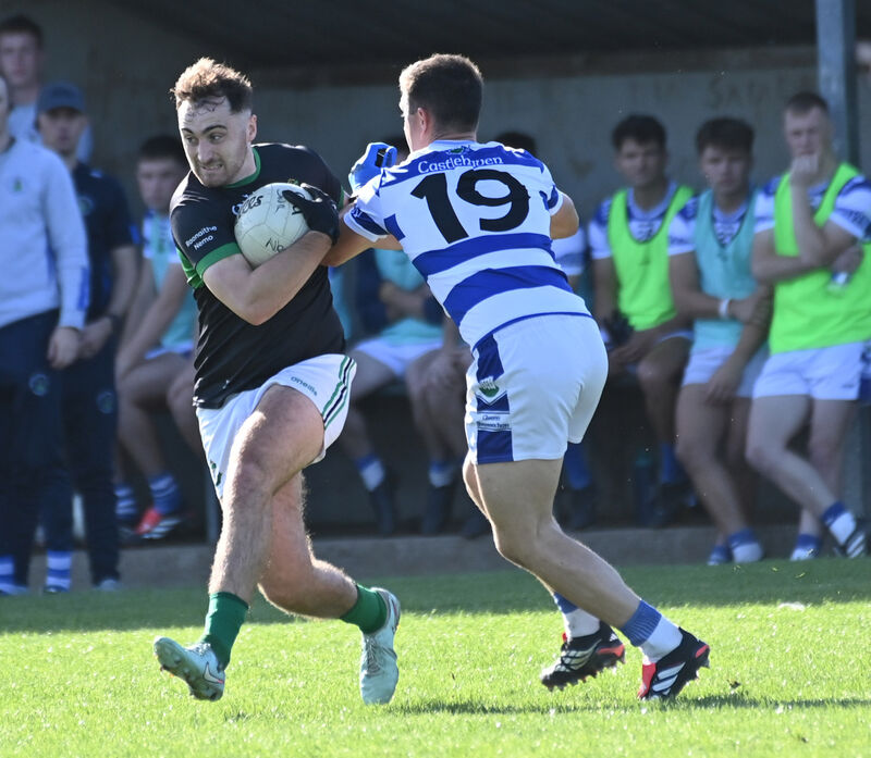 Nemo Rangers' Ronan Dalton is tackled by Castlehaven's Seán Walsh. Picture: Eddie O'Hare Nemo Rangers' Ronan Dalton is tackled by Castlehaven's Seán Walsh. Picture: Eddie O'Hare