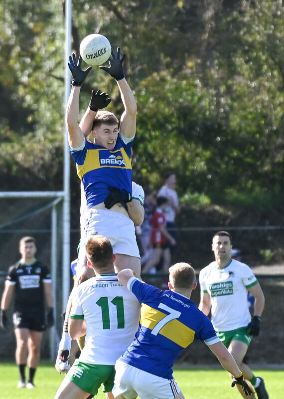 Kilshannig's Tom Cunningham goes high to win possession against Kanturk. Picture: David Keane. Kilshannig's Tom Cunningham goes high to win possession against Kanturk. Picture: David Keane.