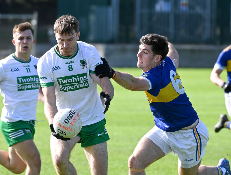 Kanturk's James Fitzpatrick is tackled by Kilshannig's Colm O'Shea. Picture: David Keane. Kanturk's James Fitzpatrick is tackled by Kilshannig's Colm O'Shea. Picture: David Keane.