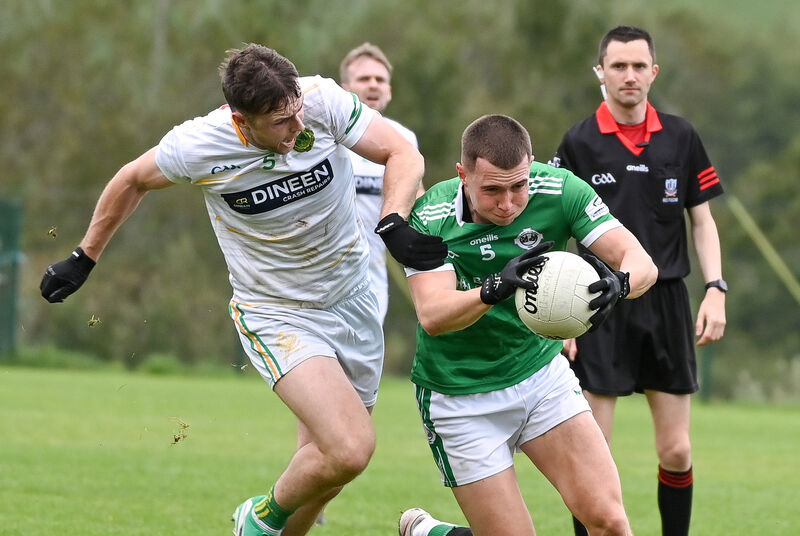 Ballincollig's Luke Fahy tries to get away from St Michael's Andrew Murphy. Picture: David Keane. Ballincollig's Luke Fahy tries to get away from St Michael's Andrew Murphy. Picture: David Keane.
