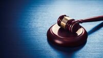 judge gavel on a blue wooden background