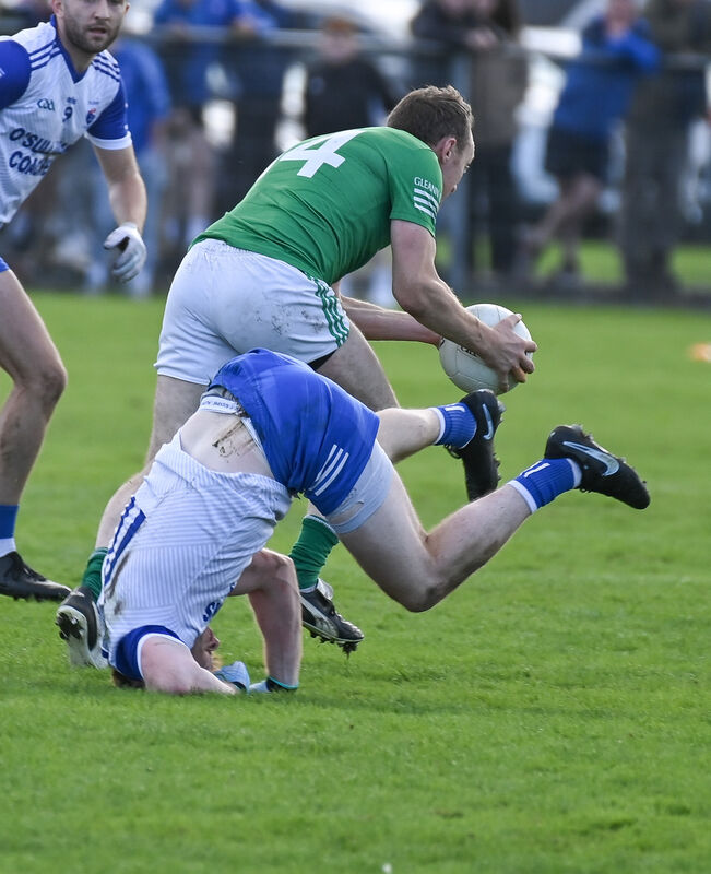  Glanworth's Sean Finn breaks past the challenge of Kildorrery's James Keating during their Intermediate AFC relegation play-off match at Shanballymore. Picture: David Keane.