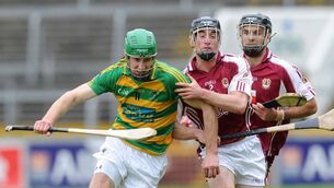 <p>Ballymartle's Brian Corry battles with Diarmuid Lester of Bishopstown in the 2012 Cork SHC semi-final at Páirc Uí Chaoimh. Picture: Des Barry</p>