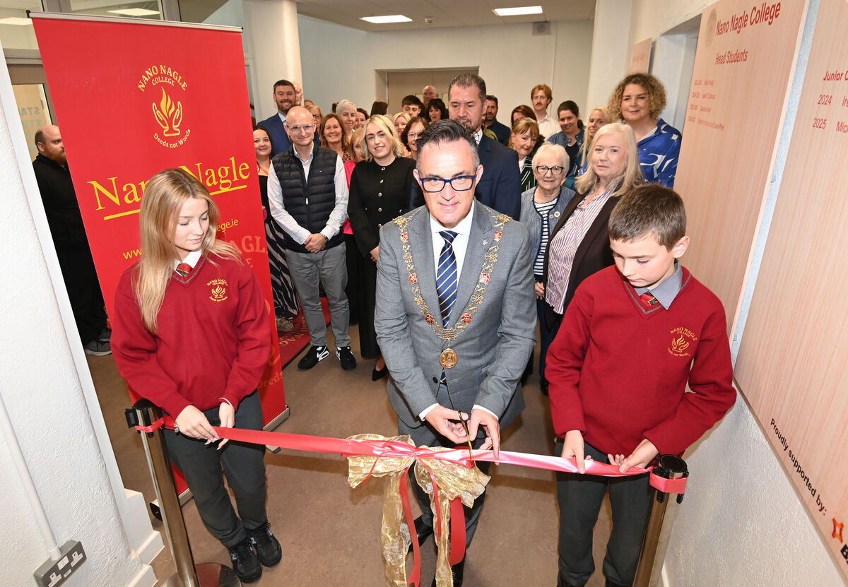 Lord Mayor Councillor Damian Boylan cuts the ribbon for the grand opening of Nanao Nagle college and unveiling of the new T4 specialist classrooms and learning support rooms with the oldest member of the student body Tori O'Connor (6th year) and the youngest member Tomás Jacob (1st year). Lord Mayor Councillor Damian Boylan cuts the ribbon for the grand opening of Nanao Nagle college and unveiling of the new T4 specialist classrooms and learning support rooms with the oldest member of the student body Tori O'Connor (6th year) and the youngest member Tomás Jacob (1st year).