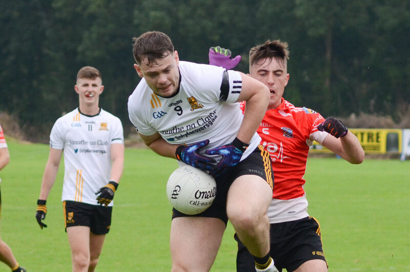 Clyda Rovers' Conor Flanagan drops the ball as Fermoy's Greg Lardner closes in. Picture: Howard Crowdy Clyda Rovers' Conor Flanagan drops the ball as Fermoy's Greg Lardner closes in. Picture: Howard Crowdy