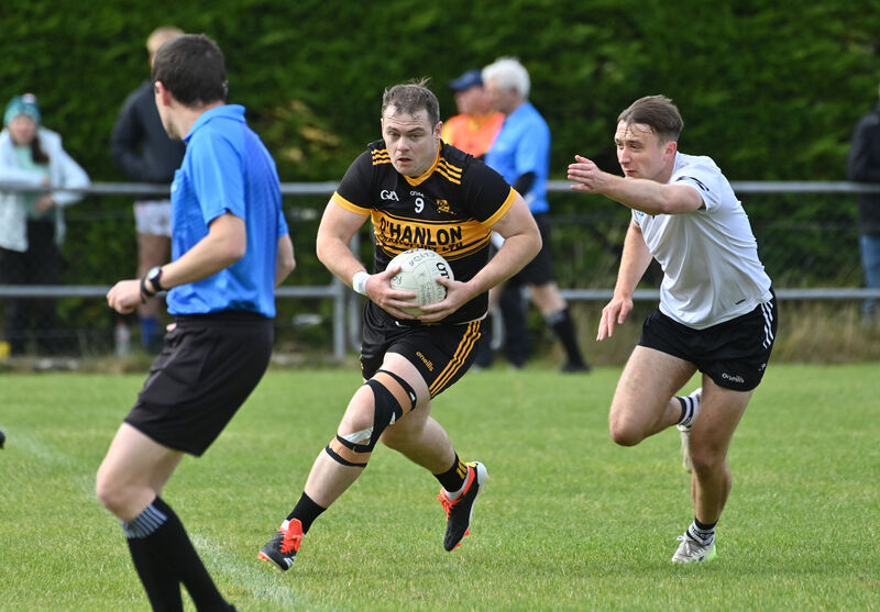 Conor Flanagan of Clyda Rovers looks to break away from Seán Meehan of Kiskeam. Picture: Dan Linehan Conor Flanagan of Clyda Rovers looks to break away from Seán Meehan of Kiskeam. Picture: Dan Linehan