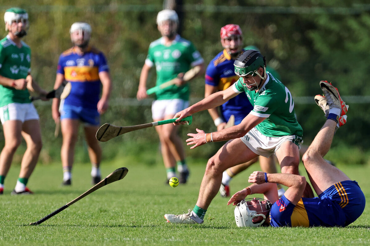  Eanna Desmond, Carrigaline, tackles Darragh O'Mahony, Ballincollig. Picture: Jim Coughlan.