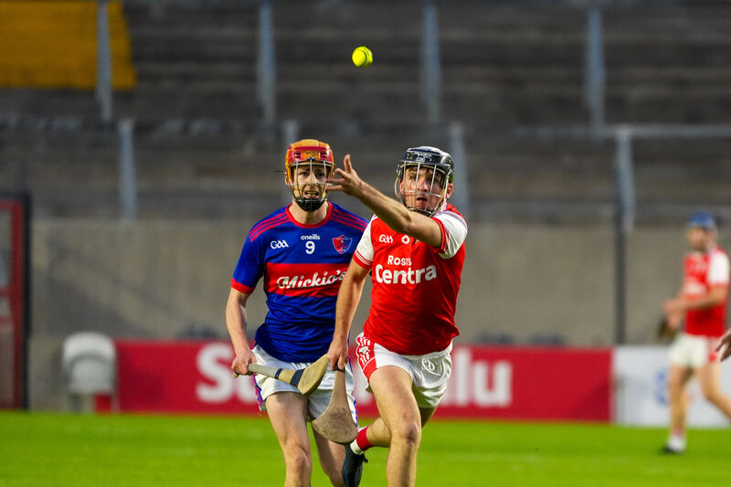Colin Cronin of Watergrasshill gets his pass away as Erin's Own's Tiernan Connell gives chase. Picture: Noel Sweeney Colin Cronin of Watergrasshill gets his pass away as Erin's Own's Tiernan Connell gives chase. Picture: Noel Sweeney