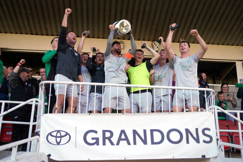 Coachford celebrate after being presented with the FAI Junior Cup, following a 2-1 victory over Evergreen in the final at the Munster FA's Turner's Cross. Picture: Barry Peelo. Coachford celebrate after being presented with the FAI Junior Cup, following a 2-1 victory over Evergreen in the final at the Munster FA's Turner's Cross. Picture: Barry Peelo.