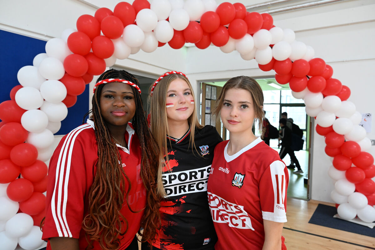 Students Martha Chea, Gabriela Kiraga, and Evie Lynch wear their Cork colours to school. Students Martha Chea, Gabriela Kiraga, and Evie Lynch wear their Cork colours to school.