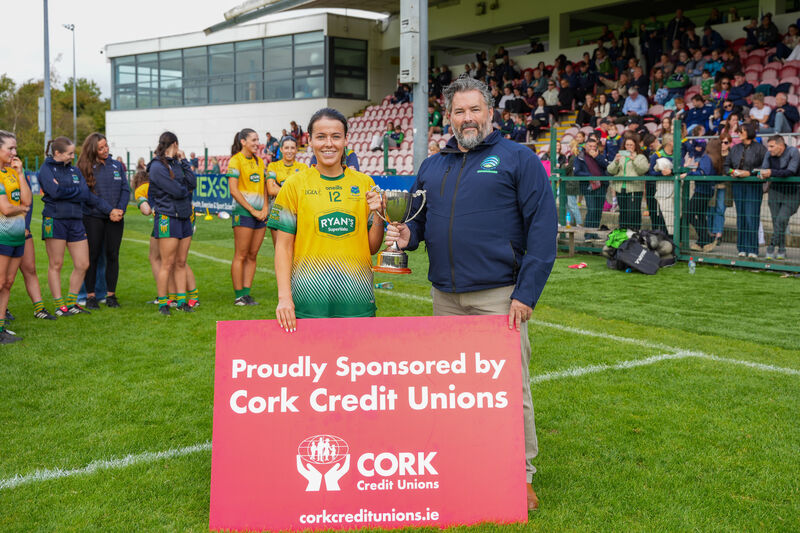 Gary McGuinness from Cork Credit Unions presents Glanmire Ladies Football team captain Ally McCarthy with the cup. Picture: Noel Sweeney Gary McGuinness from Cork Credit Unions presents Glanmire Ladies Football team captain Ally McCarthy with the cup. Picture: Noel Sweeney