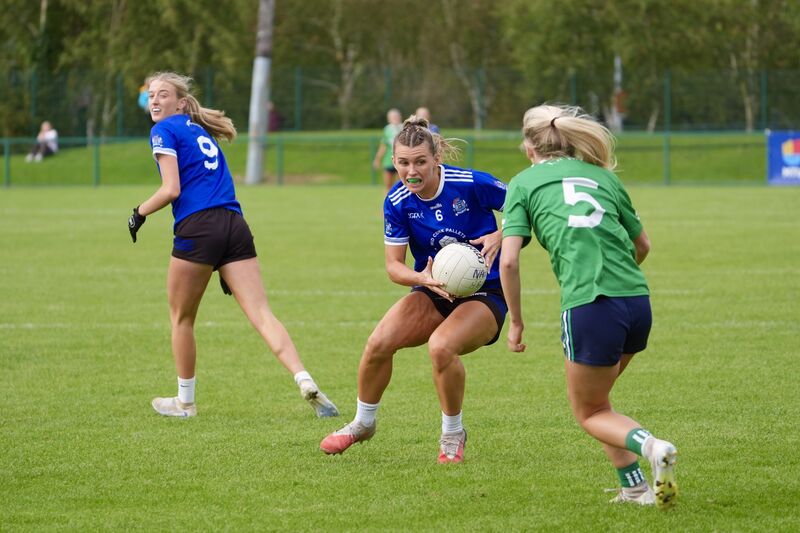Naomh Abán’s Roisín Courtney shoots past Aghada’s Ava Coughlan. Picture: Noel Sweeney Naomh Abán’s Roisín Courtney shoots past Aghada’s Ava Coughlan. Picture: Noel Sweeney