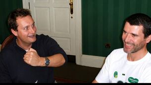 <p>Mario Rosenstock shares a joke with Cork's Roy Keane</p>