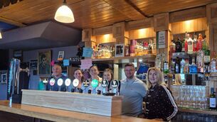 <p>A FAMILY AFFAIR: Thomas Ó Murchú with Clodagh, Fiona, Fia, Kevin and Muireann behind the bar</p> <p>A FAMILY AFFAIR: Thomas Ó Murchú with Clodagh, Fiona, Fia, Kevin and Muireann behind the bar</p>