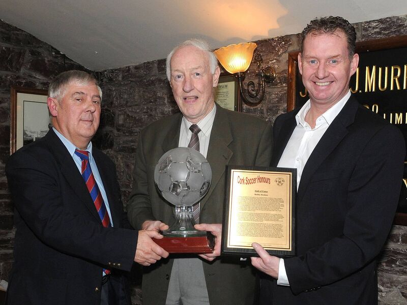 Ted O'Mahony; Cork AUL, presents the Hall of Fame award to Bobby Brohan, at the Cork AUL awards night in the Heineken Ireland Brewery, also included is Jim Cashman; Heineken Ireland. Picture: David Keane. Ted O'Mahony; Cork AUL, presents the Hall of Fame award to Bobby Brohan, at the Cork AUL awards night in the Heineken Ireland Brewery, also included is Jim Cashman; Heineken Ireland. Picture: David Keane.