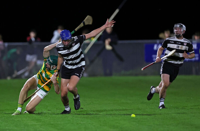 Charlie McCarthy of Midleton looks to claim possession despite the attentions of Blackrock's Ollie Walsh. Picture: Jim Coughlan Charlie McCarthy of Midleton looks to claim possession despite the attentions of Blackrock's Ollie Walsh. Picture: Jim Coughlan