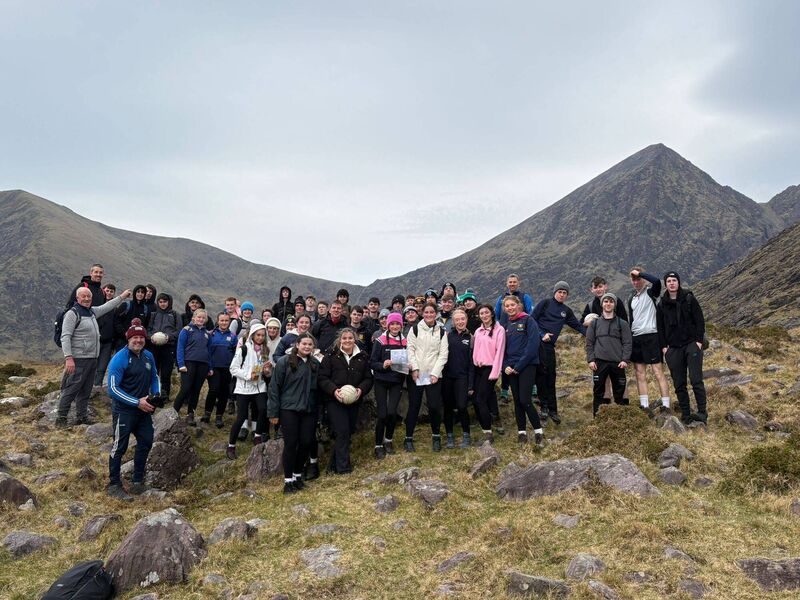 Scoil Mhuire gan Smál senior boys and girls teams with their teachers during a team building-day on top of Carrauntoohil. Scoil Mhuire gan Smál senior boys and girls teams with their teachers during a team building-day on top of Carrauntoohil.