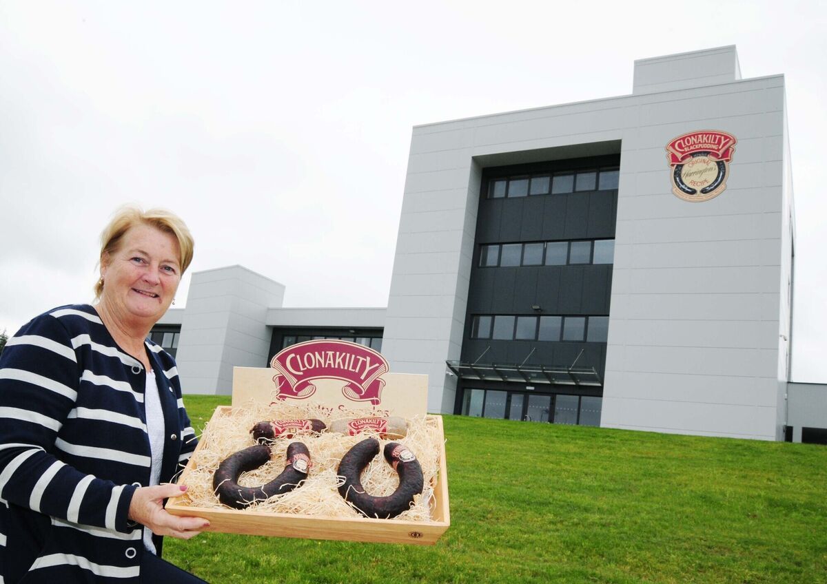 Colette Twomey, owner and managing director, Clonakilty Food Company, outside the production facility in Clonakilty, and above, rows of puddings. Colette Twomey, owner and managing director, Clonakilty Food Company, outside the production facility in Clonakilty, and above, rows of puddings.