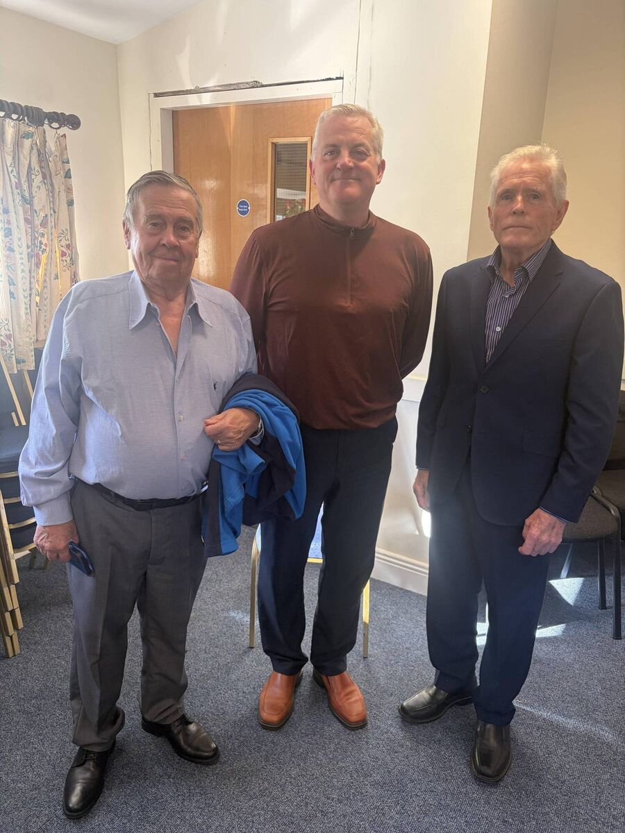 John Dolan, centre, with Joseph Philip Terry (right), author of Ráiméising, and his friend who came over for his book launch 59 years after they last saw each other