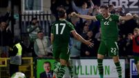 Tommy Lonergan celebrates with Oisín Gallagher  after he scores his sides 3rd goal of the match 6/10/2026
