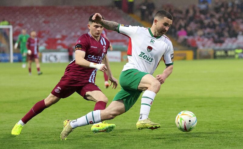 Sean Maguire, Cork City, breaks from Luka Le Brevet and Shane Griffin, Cobh Ramblers. Picture: Jim Coughlan. Sean Maguire, Cork City, breaks from Luka Le Brevet and Shane Griffin, Cobh Ramblers. Picture: Jim Coughlan.