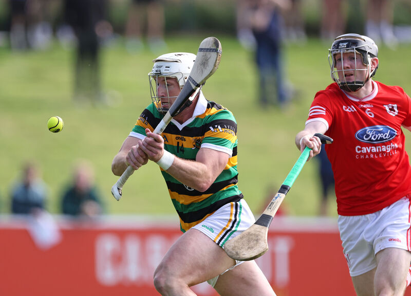 Patrick Horgan, Glen Rovers, gets his shot away to hit the net goal under pressure from Finbarr Cagney, Charleville. Picture: Jim Coughlan. Patrick Horgan, Glen Rovers, gets his shot away to hit the net goal under pressure from Finbarr Cagney, Charleville. Picture: Jim Coughlan.