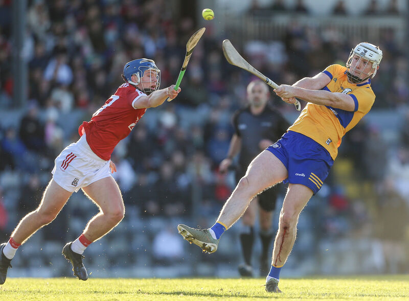 Cork's Cathal McCarthy puts pressure on Clare's Cian Barron during the Co-op SuperStores Munster HL game at Páirc Uí Rinn in 2024. Picture: Inpho/Ken Sutton