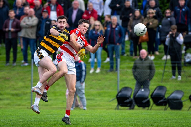 Adrigole’s Cian O’Shea and Buttevant’s Aaron Horgan collide in the air. Picture: Chani Anderson Adrigole’s Cian O’Shea and Buttevant’s Aaron Horgan collide in the air. Picture: Chani Anderson