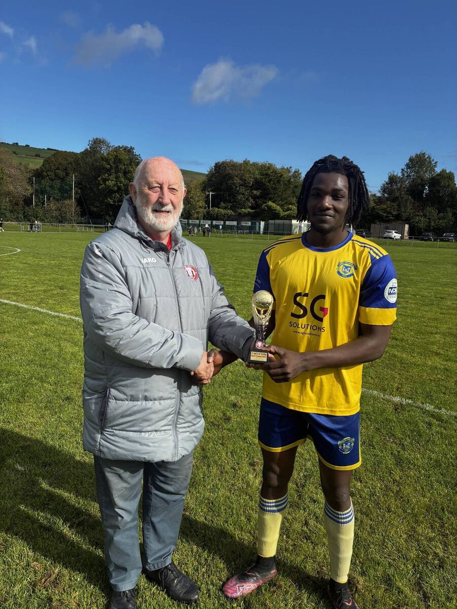 Youth Soccer: Sean O’Sullivan, chairman of the Cork Youth League, presenting the Gary McCarthy Trophies Man of the Match award to Douglas Hall’s David Aduroja. Youth Soccer: Sean O’Sullivan, chairman of the Cork Youth League, presenting the Gary McCarthy Trophies Man of the Match award to Douglas Hall’s David Aduroja.