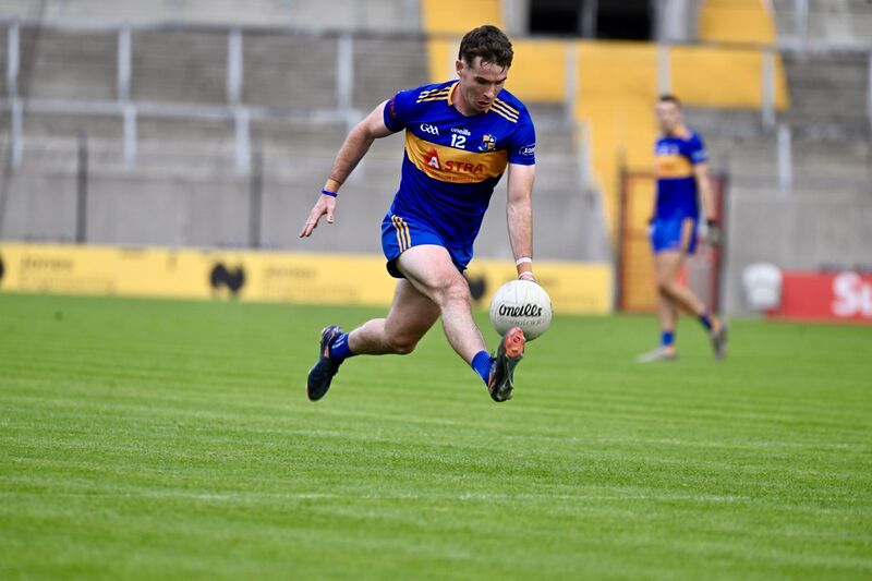  Eanna Desmond with possession for Carrigaline. Picture: Larry Cummins