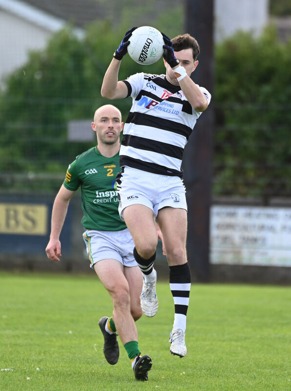 St Nicks' Conor McCarthy wins the ball from Cobh's Adam McCarthy. Picture: Eddie O'Hare