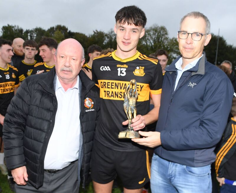 Cormac O'Sullivan received the Man of the Match Award from Shane Murphy in the presence of Tony McAuliffe, Chairman, Duhallow GAA after Castlemagner's victory in the Ashgrove Renewables Duhallow JAFC Final. Picture John Tarrant Cormac O'Sullivan received the Man of the Match Award from Shane Murphy in the presence of Tony McAuliffe, Chairman, Duhallow GAA after Castlemagner's victory in the Ashgrove Renewables Duhallow JAFC Final. Picture John Tarrant