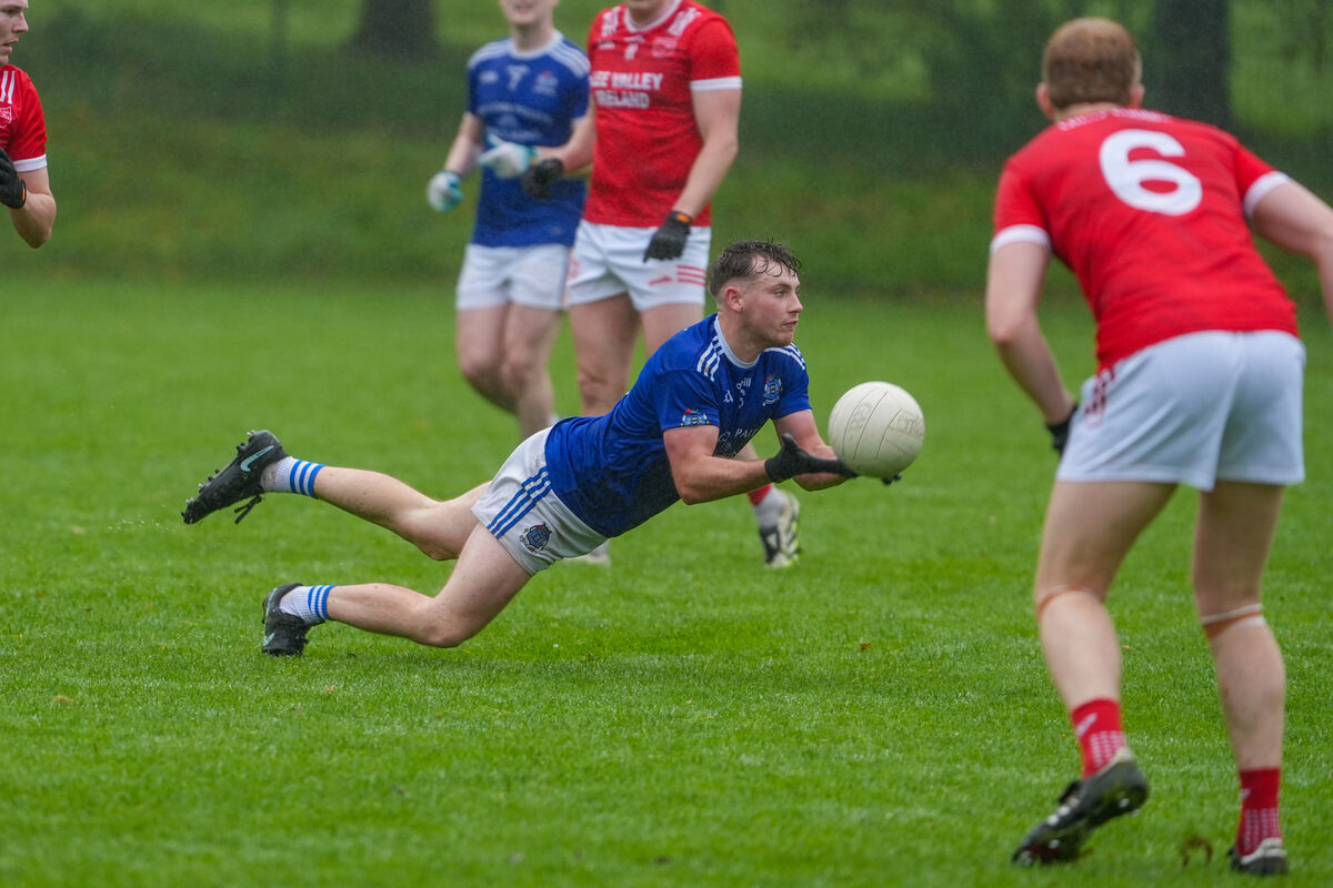 Naomi Abán’s Daire Mickey Ó Loinsigh passes the ball after a tough tackle. Picture: Noel Sweeney Naomi Abán’s Daire Mickey Ó Loinsigh passes the ball after a tough tackle. Picture: Noel Sweeney