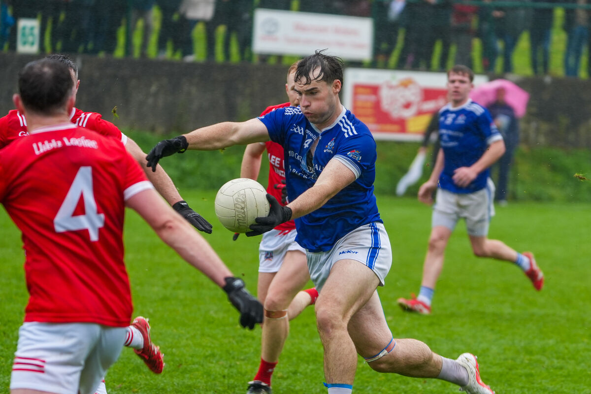 Naomh Abán’s Daire Ó Laoire fires a point under pressure. Picture: Noel Sweeney Naomh Abán’s Daire Ó Laoire fires a point under pressure. Picture: Noel Sweeney