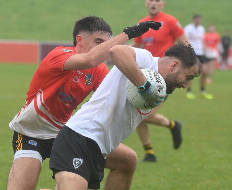 Kiskeam's Jack O'Connor is tackled by Fermoy's David Lardner. Picture: Eddie O'Hare