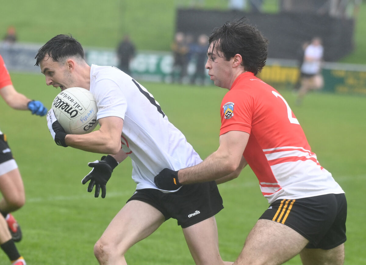 Kiskeam's Shane O'Riordan is held by Fermoy's James Molloy. Picture: Eddie O'HareHare Kiskeam's Shane O'Riordan is held by Fermoy's James Molloy. Picture: Eddie O'HareHare