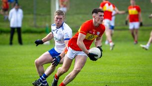 <p>Éire Óg’s Conor McGoldrick is chased by Cill na Martra’s Antóin Ó Cuana. Picture: Chani Anderson</p>