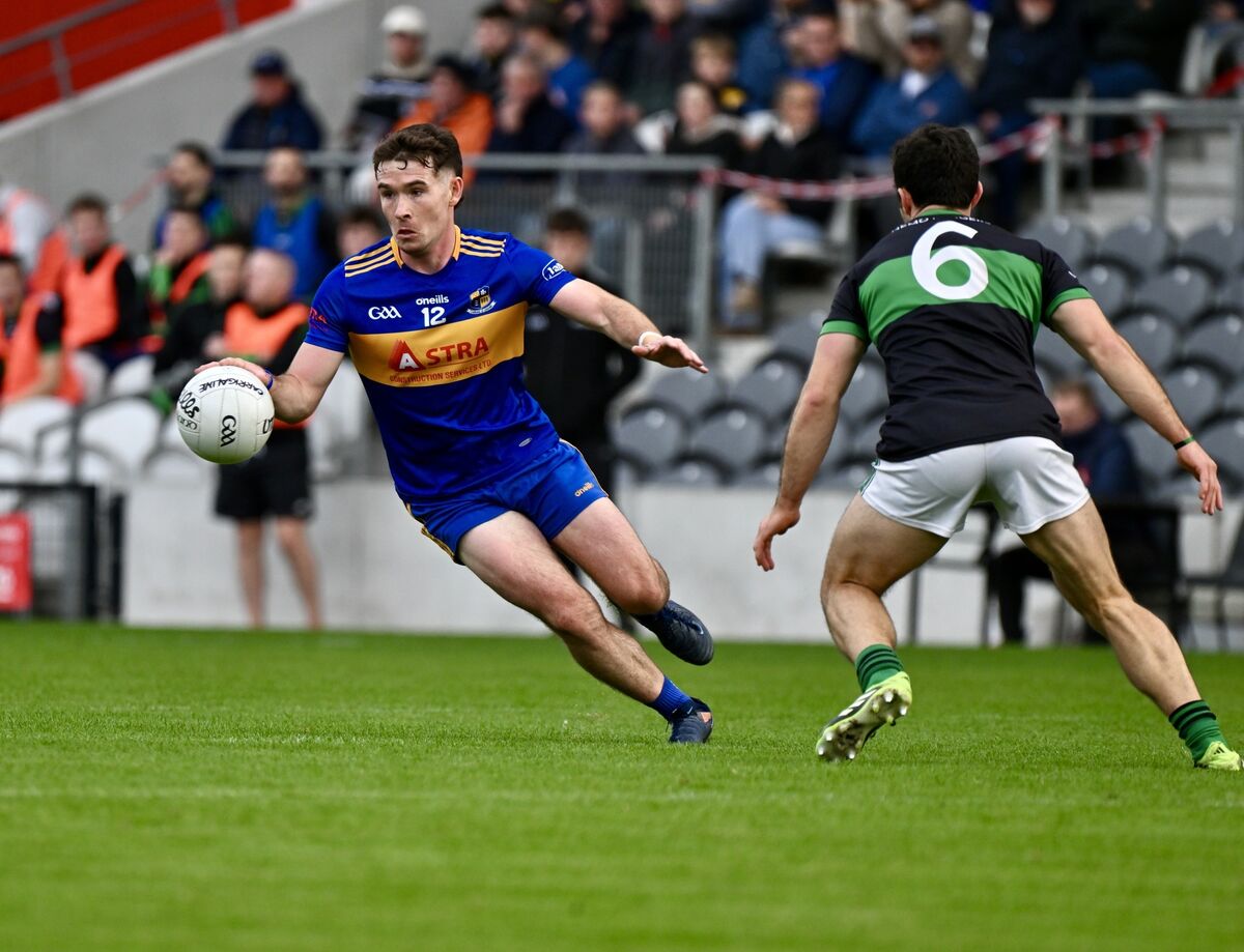  Eanna Desmond in action for Carrigaline against Stephen Cronin of Nemo Rangers. Picture: Larry Cummins