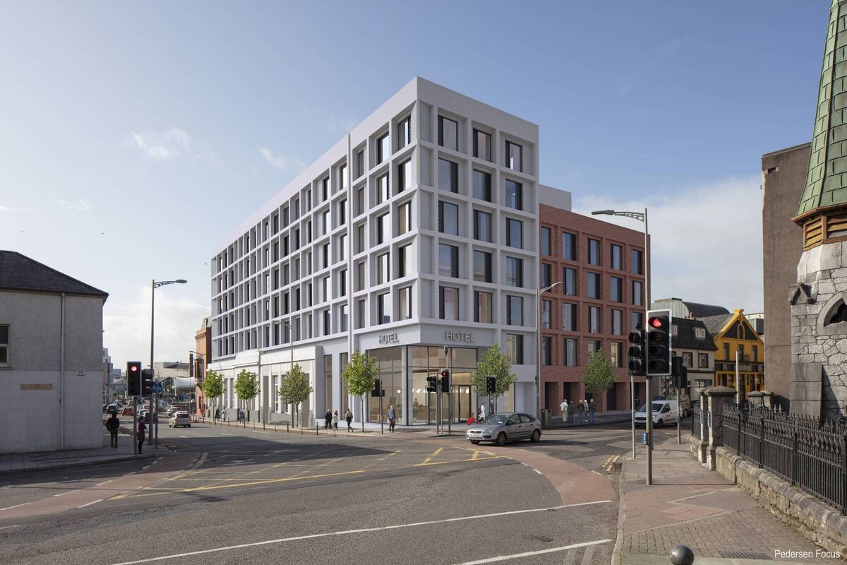 Images of the proposed hotel on the busy junction.