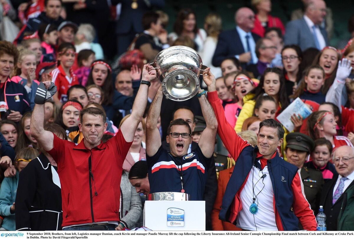 Paudie Murray (right) with his brothers Damien and Kevin after Cork's 2018 All-Ireland camogie win. All three are part of the St Finbarr's set-up. Picture: David Fitzgerald/Sportsfile