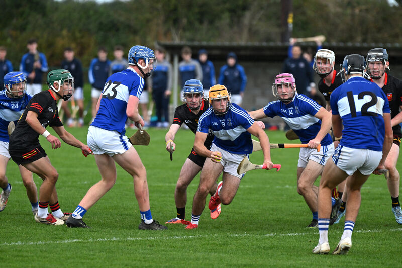 Nathan Ó Cofaigh (Na Piarsaigh) battles with Gaelcholáiste Mhuire AG North Mon as they seek a late goal in the TUS Corn an Artaigh Harty Cup Round 1 game at Castlelyons. Gaelcholáiste Mhuire AG North Mon vs Ardscoil Rís. Picture: Larry Cummins Nathan Ó Cofaigh (Na Piarsaigh) battles with Gaelcholáiste Mhuire AG North Mon as they seek a late goal in the TUS Corn an Artaigh Harty Cup Round 1 game at Castlelyons. Gaelcholáiste Mhuire AG North Mon vs Ardscoil Rís. Picture: Larry Cummins
