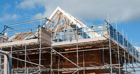 Loading platform made of scaffold system on housing development construction site